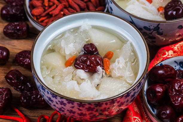 Snow Fungus and Pear Sweet Soup Dessert Chinese Healthy Snow Fungus and Pear Sweet Soup Dessert Chinese Healthy pear dessert stock pictures, royalty-free photos & images
