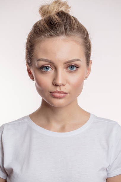 istock good looking girl with serious face 1128894533
