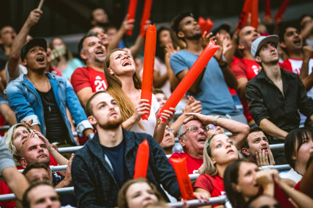 istock Excited crowds on a sports stadium 1128896711