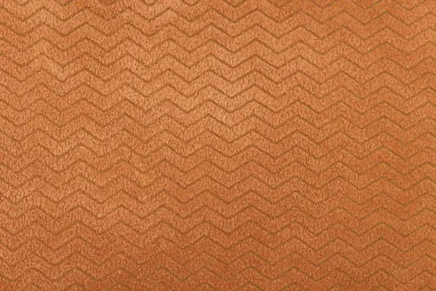 Photo of Detailed textile orange fabric texture, background.