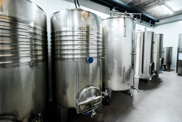 istock Inox wine barrels stacked in modern winery cellar in Spain. 1128899405