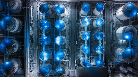 Storage tank of liquid chemical and petrochemical product tank, Aerial view at night.