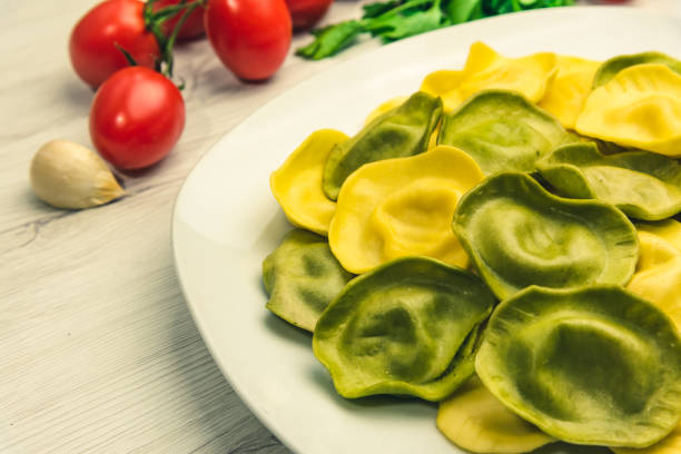 istock Cassic ravioli with filled basilico and cheese in a plate 1128902405