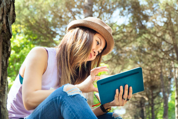 istock Asian girl studying at University Campus 1128903370