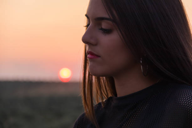 istock girl posing on a road 1128905404