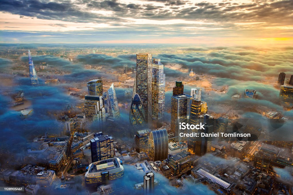 The City of London of the Future Above the Clouds A composite / hypothetical computer photoshop image of the city of London above the clouds including possible future development. London - England Stock Photo