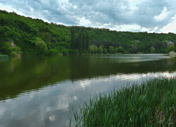 istock Calm lake in the evening 1128906046