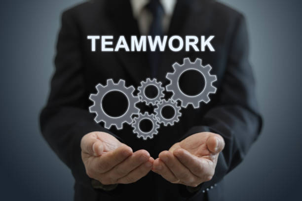 Teamwork cogwheel cooperation businessman hands support business strategy