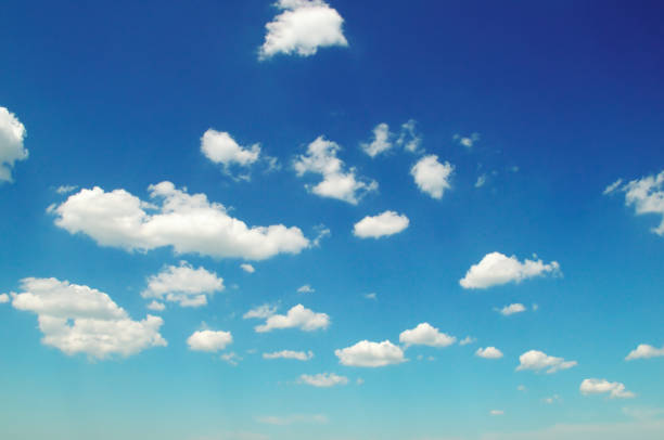 istock Light cumulus clouds in the blue sky. 1128907837