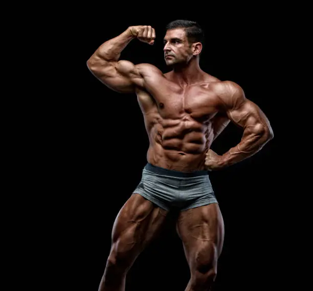 Muscular Men Flexing Muscles
