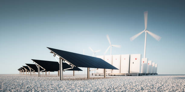 istock Concept of renewable energy storage at bright clean blue sky environment. Modern black photovoltacis, modular battery energy storage system and a wind turbine system in the background. 3d rendering. 1128909172