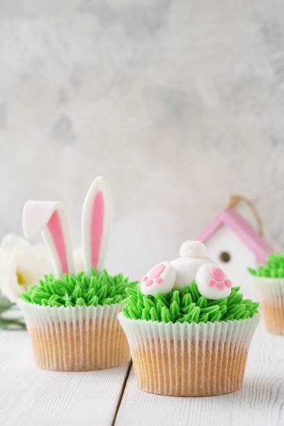 istock Easter bunny cupcakes, Easter food idea for kids. 1128911999
