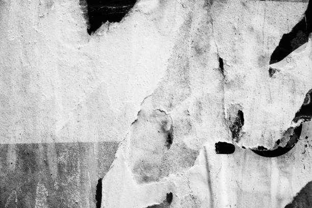 istock Blank white black old ripped torn paper crumpled creased posters grunge textures backdrop backgrounds placard 1128912237