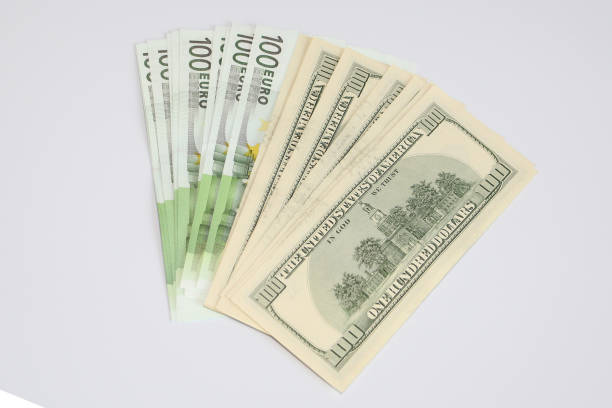 Dollars and euros on a white background. Cash to open your business.