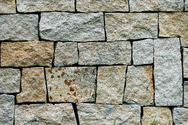 istock Close up of stone wall 1128914753