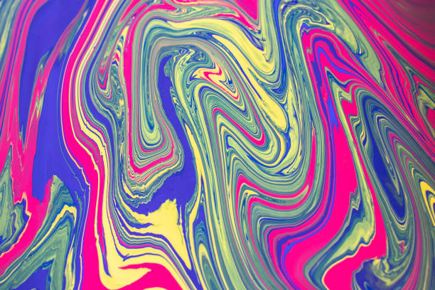 istock Abstract background with psychedelic painting in vivid colors. 1128921333