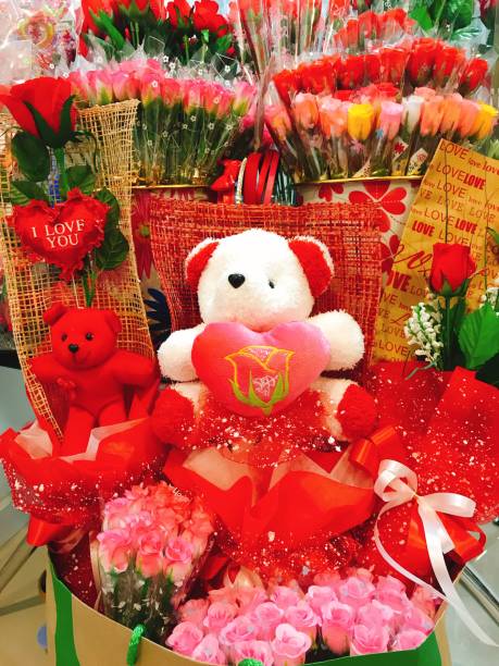 istock Valentine day with bear doll  and red roses 1128922221