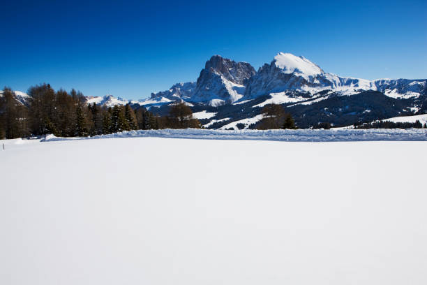 istock snow covered Dolomite alps landscape with mountains 1128923300