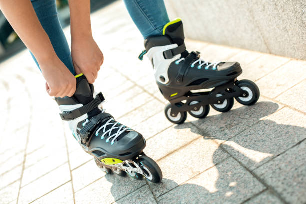 istock Young woman with roller skates outdoors active lifestyle 1128923391