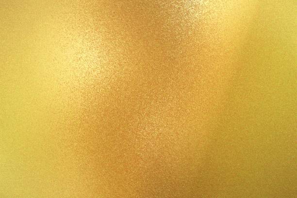 istock Texture of yellow brushed metallic plate, abstract background 1128925043