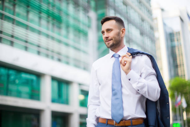 istock Making business deals everywhere he goes / successful man 1128926121