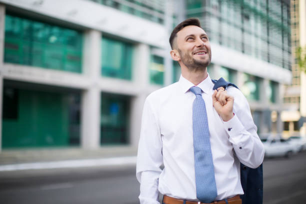 istock Making business deals everywhere he goes / successful man 1128926223
