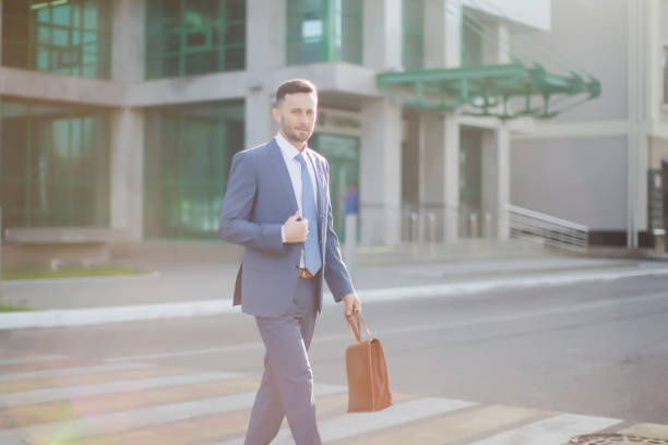istock Making business deals everywhere he goes / successful man 1128927342