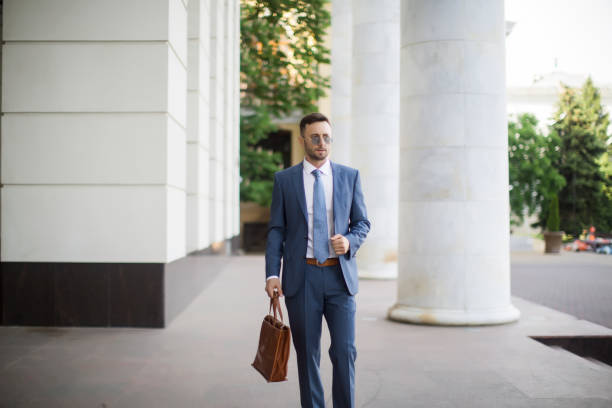 istock Making business deals everywhere he goes / successful man 1128927517