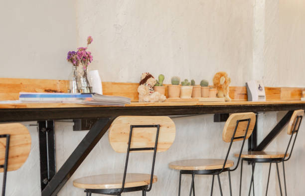 istock Empty on people . Coffee shop interior design With chairs and white walls. 1128928211