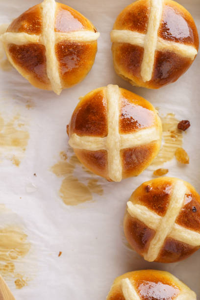 istock Traditional hot cross buns. Sweet Easter pastry. Top view. 1128930799