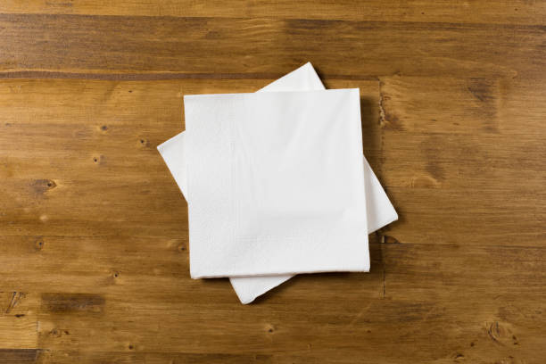 istock white paper napkin on wooden background 1128931129