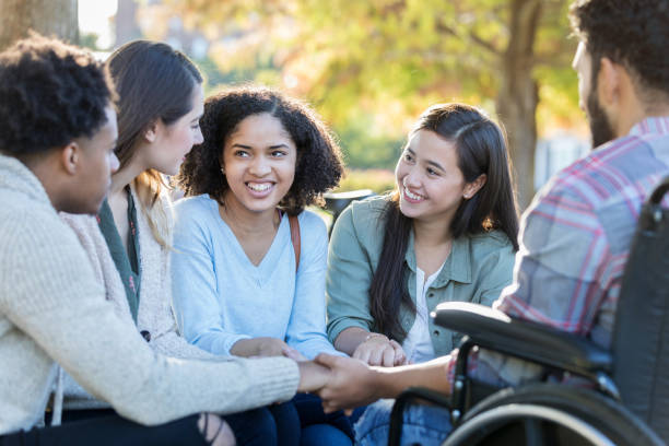 istock Diverse young adult friends enjoy spending time together 1128932912
