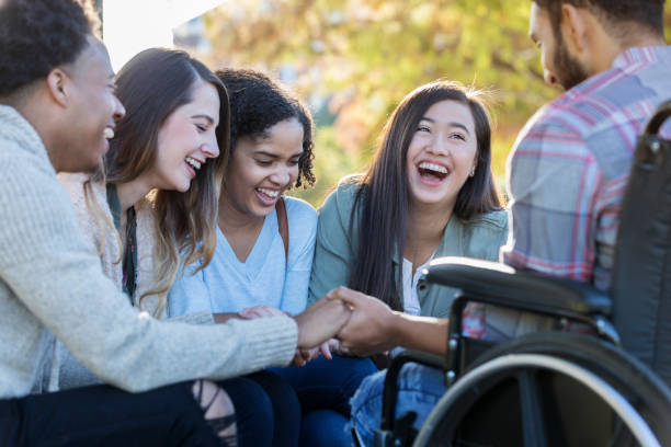 istock College friends laughing together 1128932926