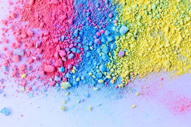 istock Colorful background of chalk powder. Multicolored dust particles splattered on white background. 1128935041