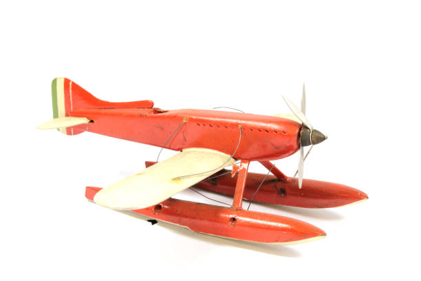 istock Vintage Toy Aeroplane on White Background 1128935110