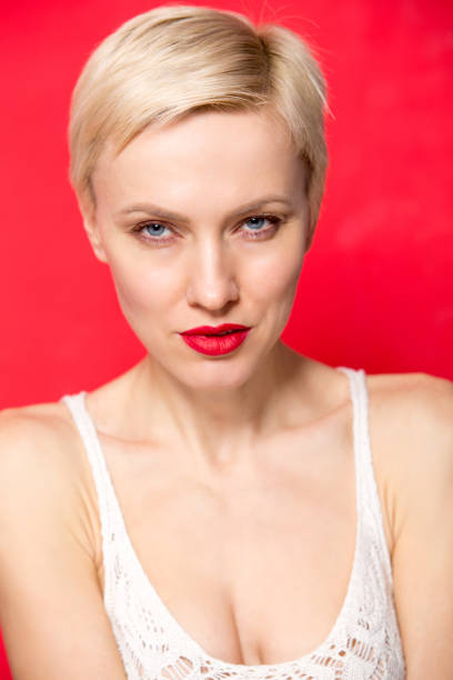 istock Blonde woman with short haircut 1128935569