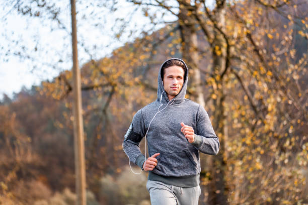 istock Young male athlete running in the nature 1128937203