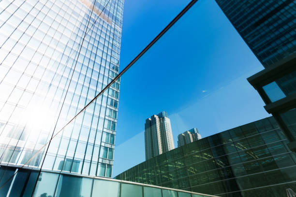 istock Modern building is reflecting on the glass wall 1128938189