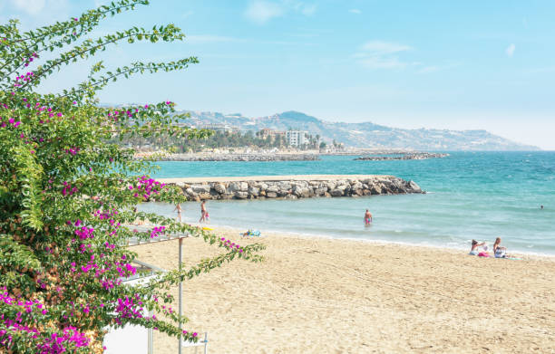 The beach of the Italian city San Remo in the province of Liguria San Remo, Italy, September 18, 2018:  The beach of the Italian city San Remo in the province of Liguria san remo italy photos stock pictures, royalty-free photos & images