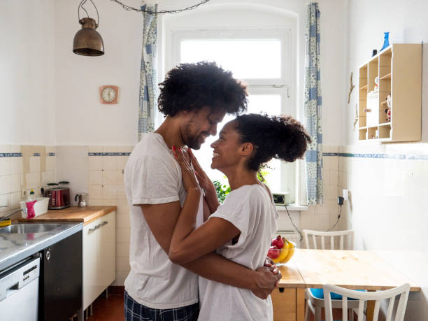 istock Morning love, couple in kitchen 1128938553
