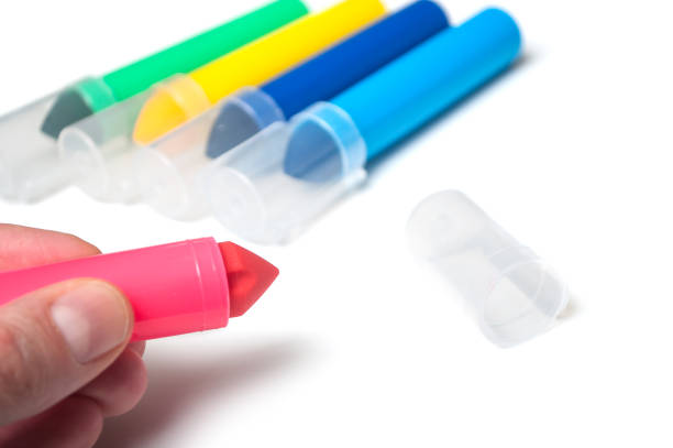 istock colorful felt pen collection in hand on white background 1128938572