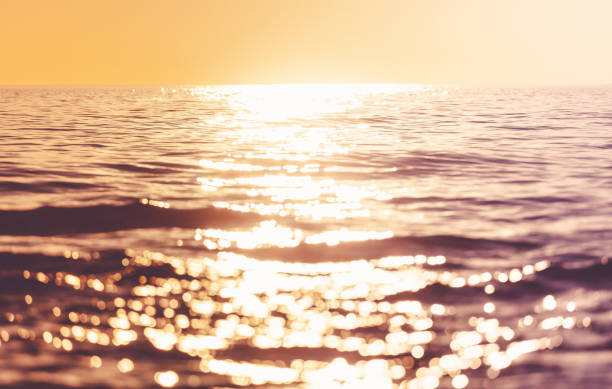 istock Waves crashing during wonderful sunset in southern Europe 1128942630