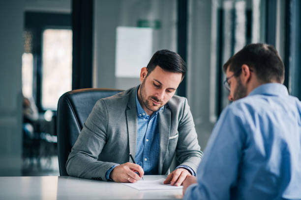 istock Welcome on board. Business men handshake in the office. 1128944859