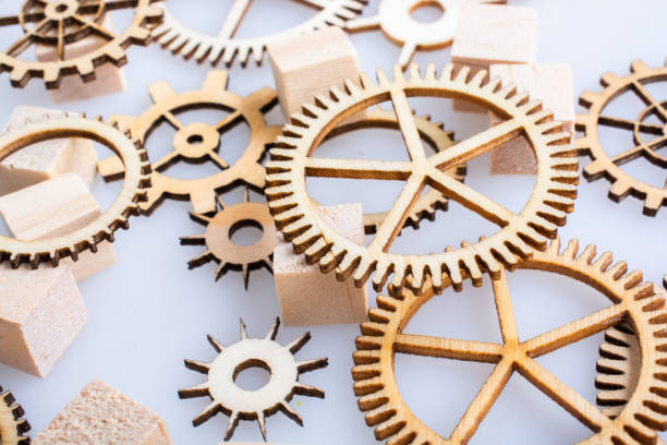 istock Gear wheels on white background as concept of engineering 1128945228