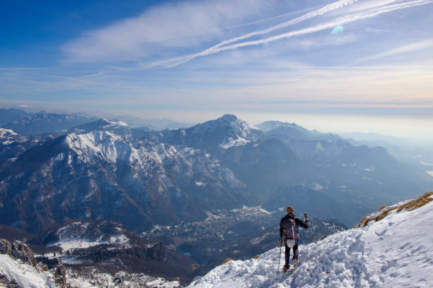 Alpinist solo on the ridge of the mountain