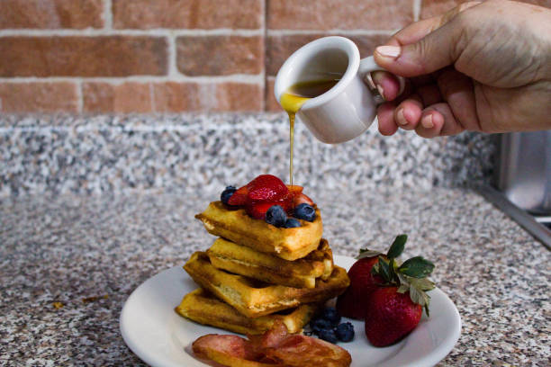 istock waffles with strawberries and blueberries 1128948534