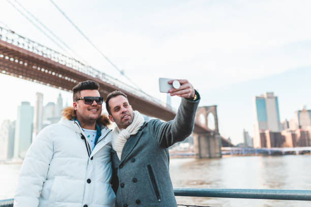 istock LGBT couple taking selfies in New York 1128950441