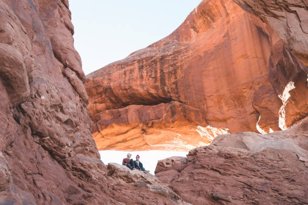istock Couple hiking in the Utah desert 1128950676