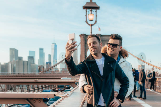istock LGBT couple taking selfies in New York 1128950726