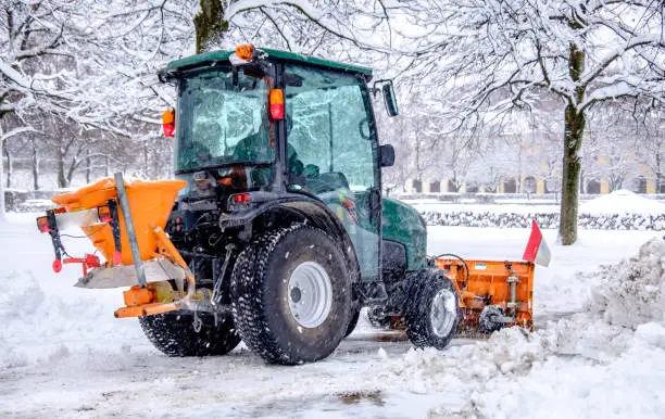 snowplow at a street in hamburg/germany